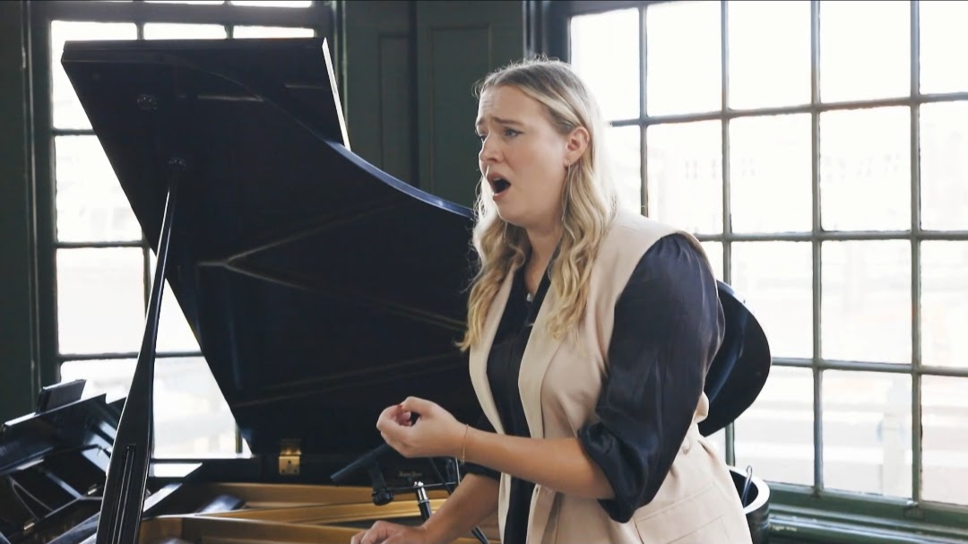 Soprano performing a solo recording session