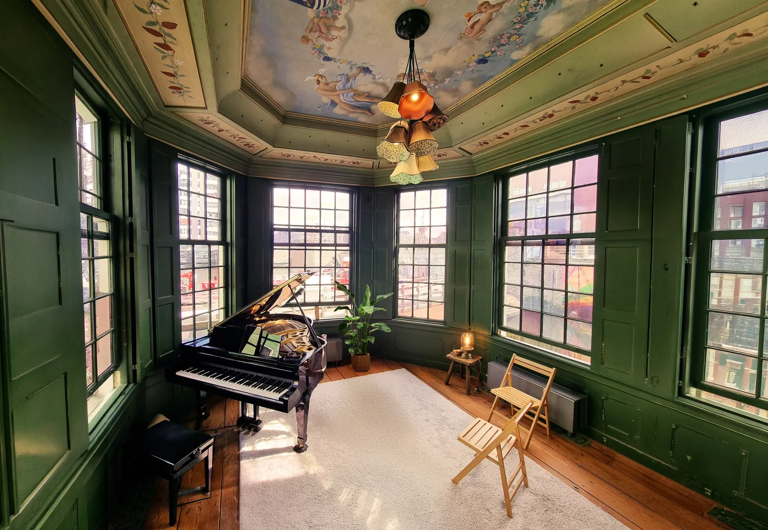 Wide view of the Teahouse recording room, grand piano beneath the painted ceiling